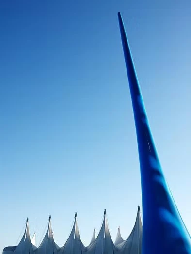 a long and slender sculpture in the form of a gigantic and elegant water droplet